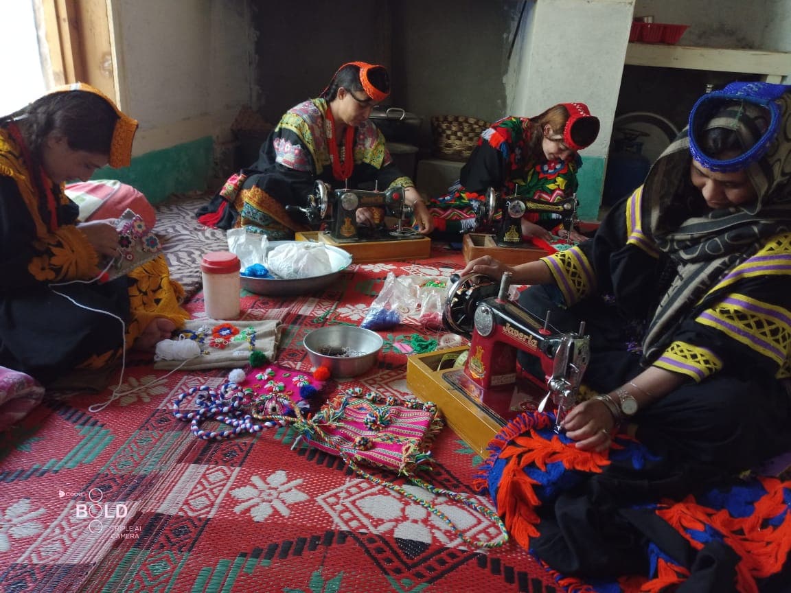 Women taking part in activities at the Kalash Sewing Center