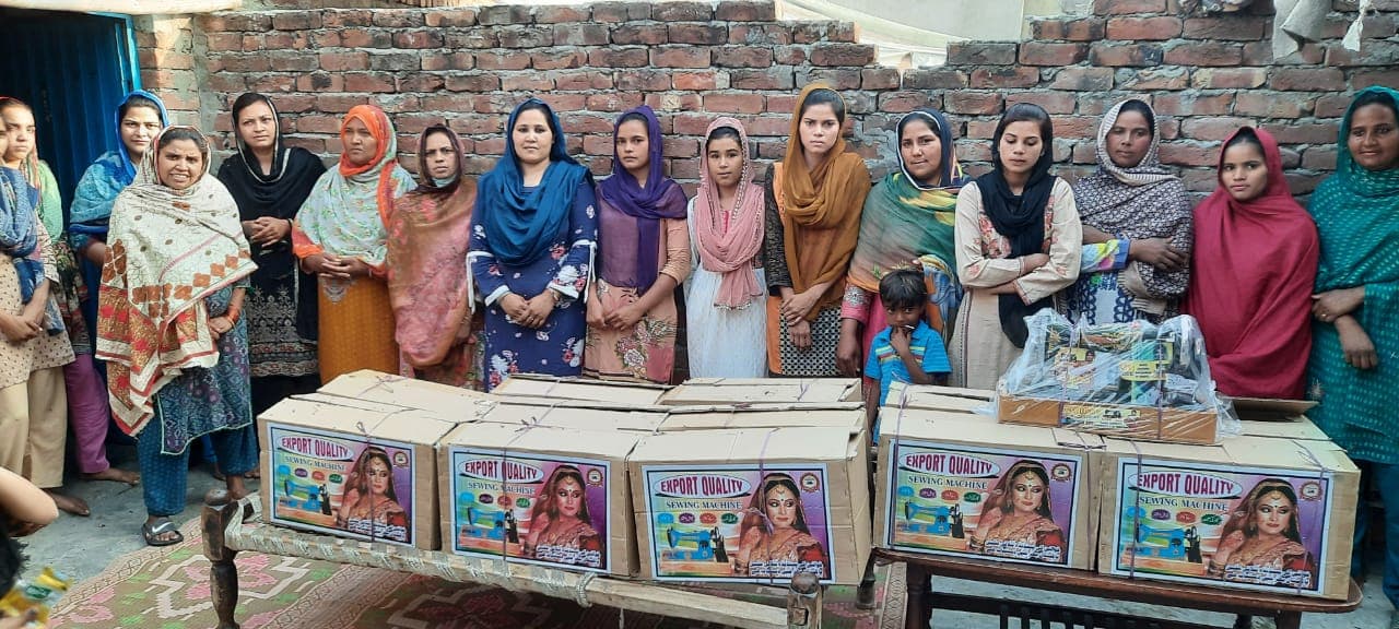 Women taking part in sewing center activities in Bahawalpur